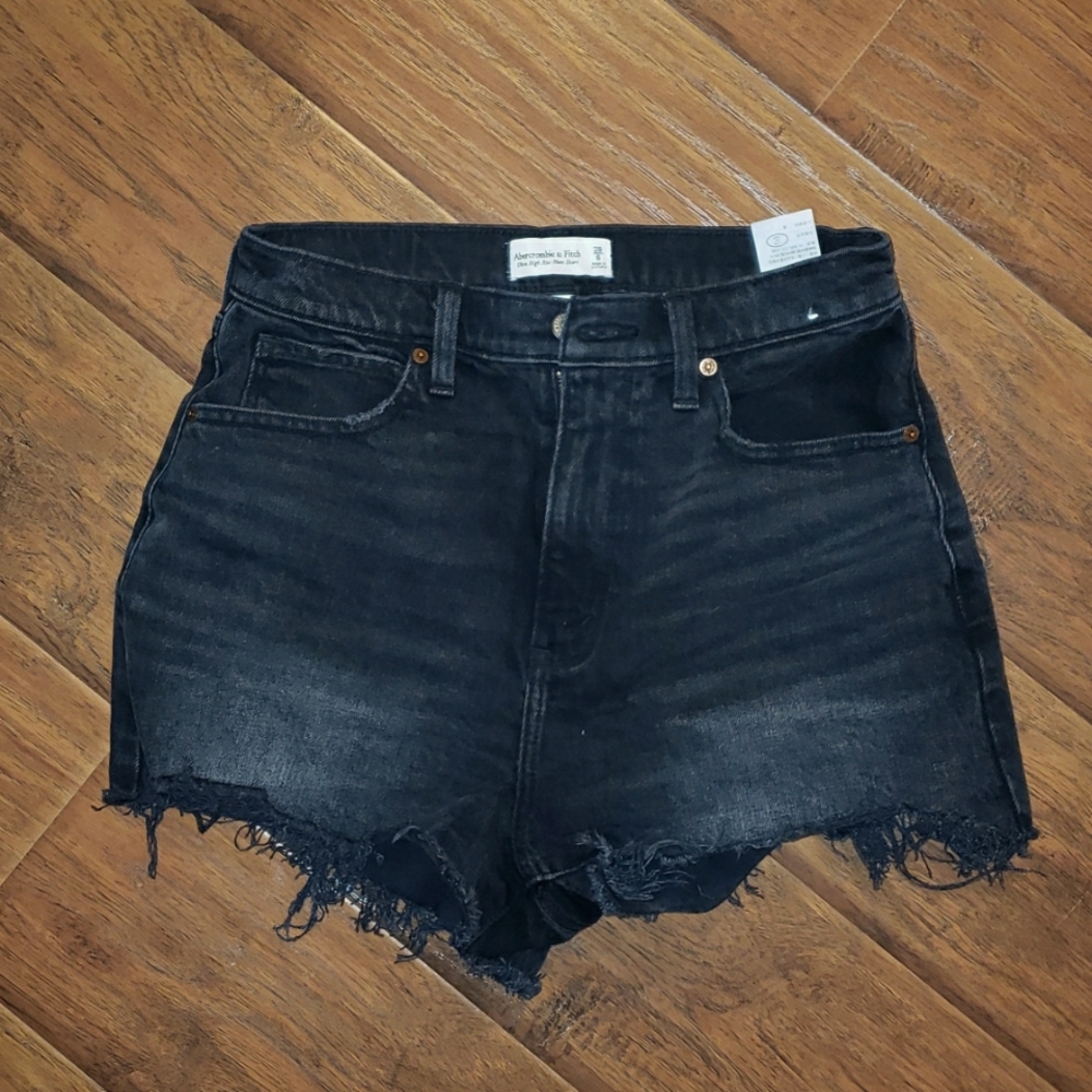 Black distressed jean shorts